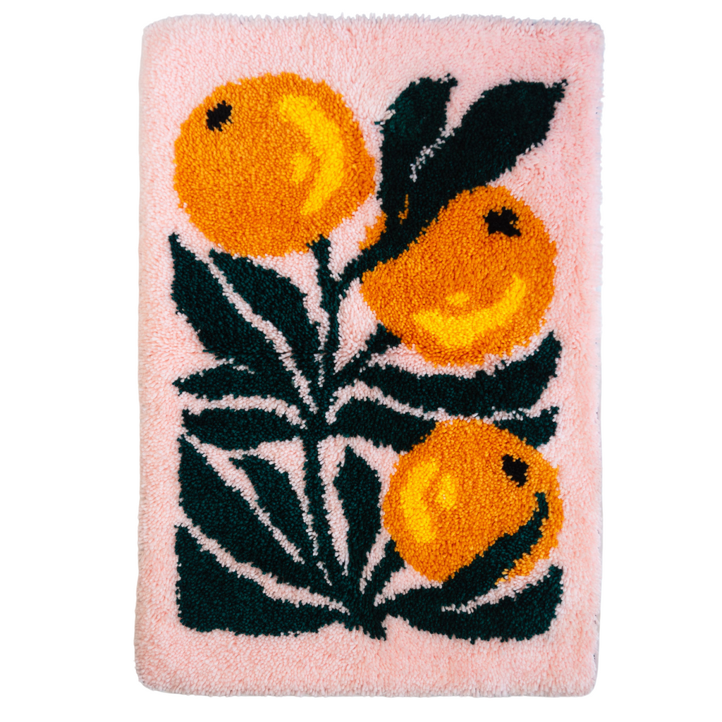 Cutout of finished oranges latch hook rug kit