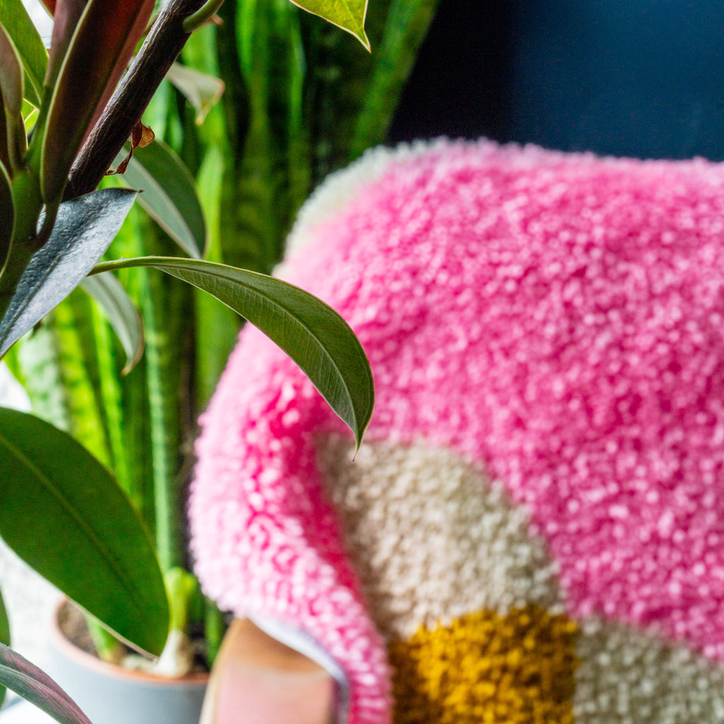 close up of pink detailing on rug