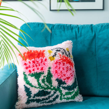 Graphic floral latch hook cushion kit with red and pink flowers